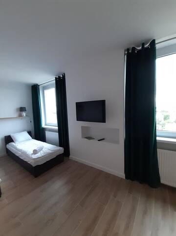 Фото номера Улучшенные апартаменты Отель Hotel Metalowiec г. Сталёва-Воля 8